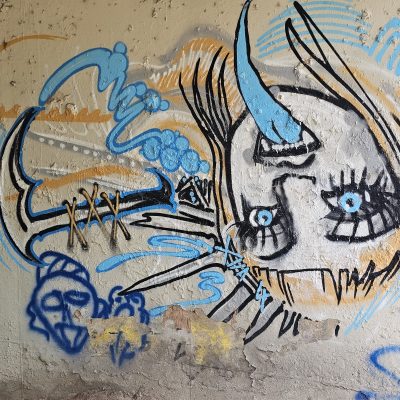 Colorful abstract graffiti on a concrete wall
